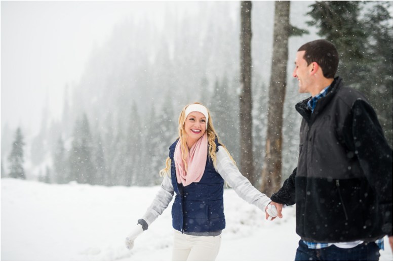 couple-walking-in-snow-winter-mountains.jpg
